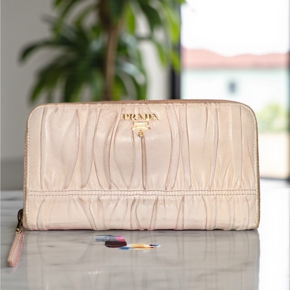 Prada Handbags - Prada Nappa Gaufre Zip Around Wallet Cipria serial # 107